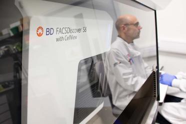 Platform Manager Andrew Goldson in the single-cell labs using the BD Facs Discover Cell Sorter