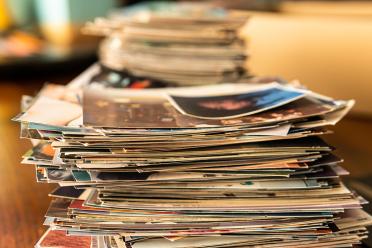 Stack of old photos and memorabilia 